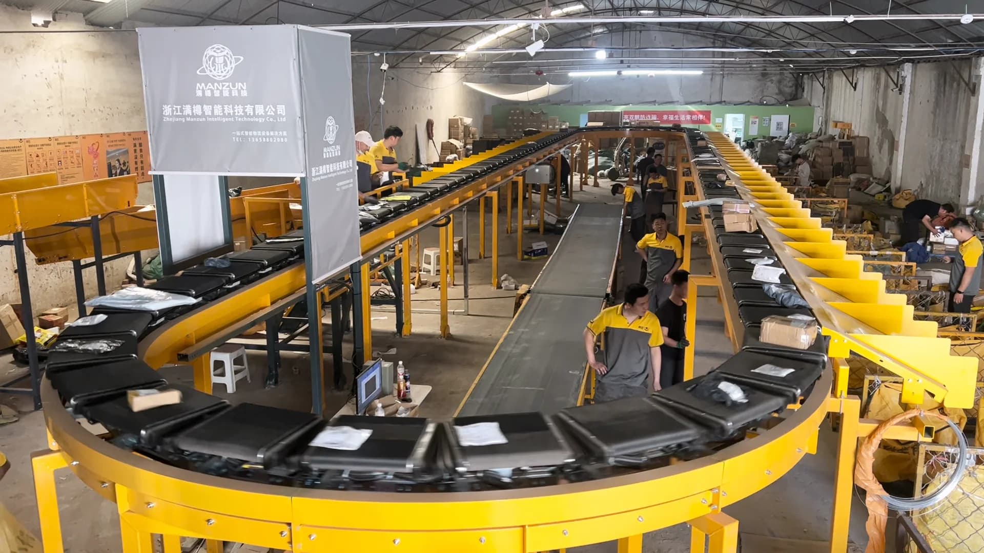 Automated parcel sorting equipment in a manufacturing workshop