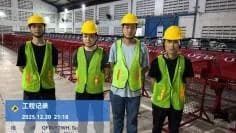 Project team beside a flip-plate sorting installation in Tangerang, Indonesia